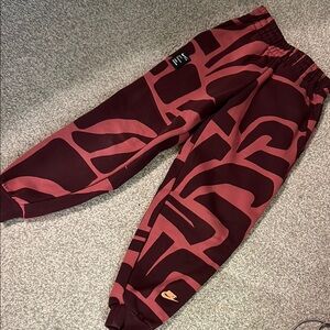 Nike Burgundy and Rose Graphic Joggers